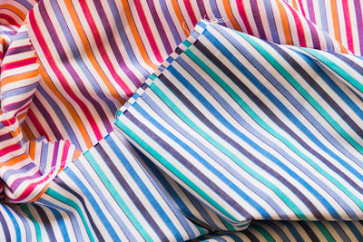The Symbolic Significance of Striped Ties in Different Cultures: A Paul Malone Guide